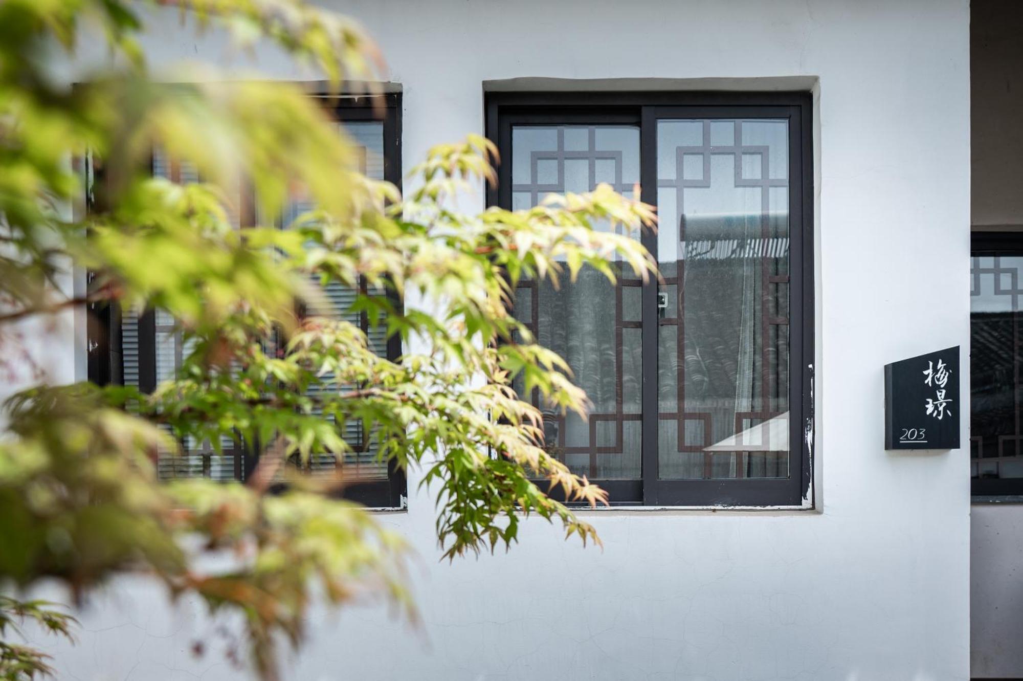 Tingjian Musu Private Soup Design Homestay - South Gate Of Wuzhen Xizha Scenic Area Тунсян Экстерьер фото