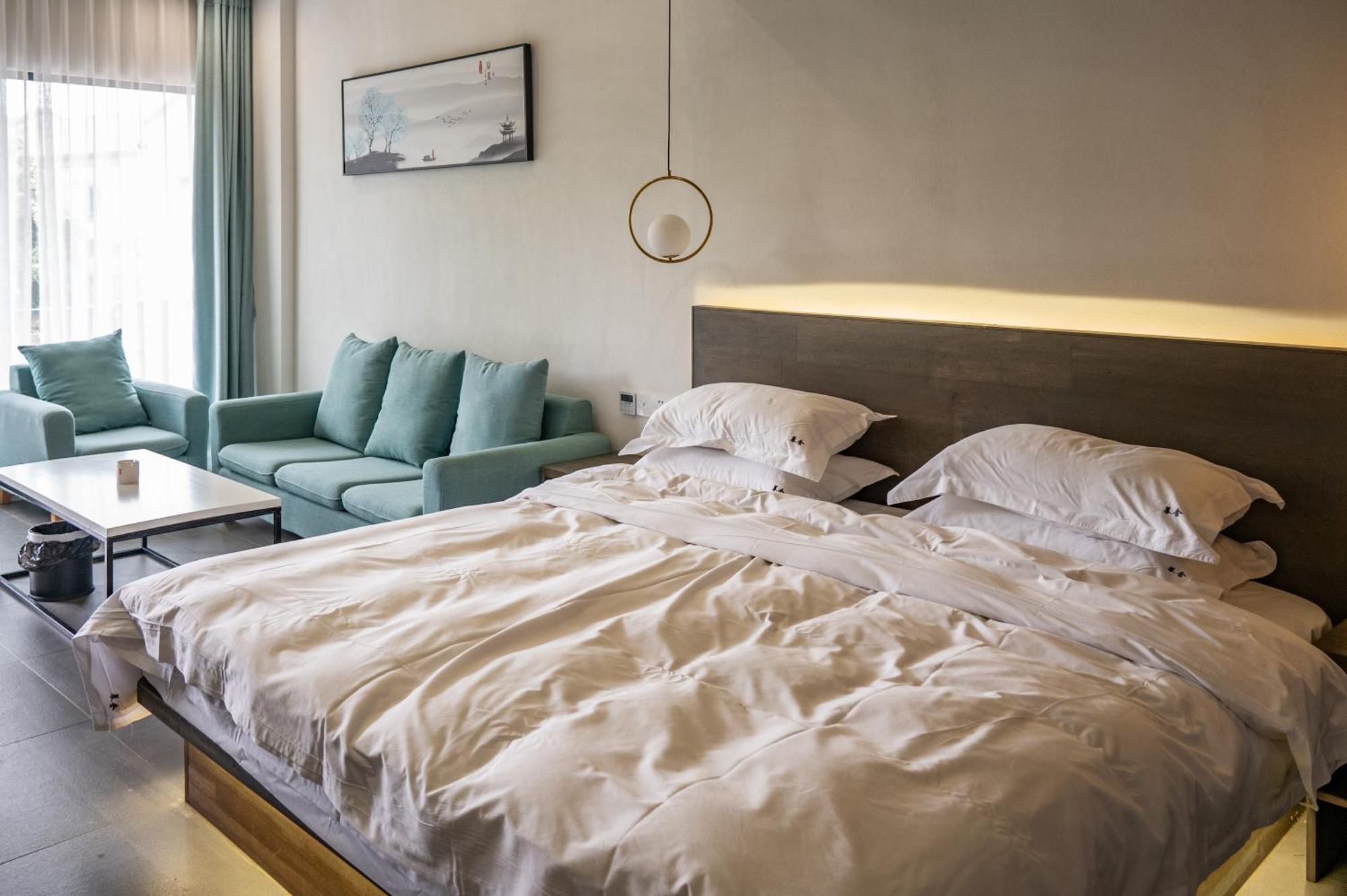Tingjian Musu Private Soup Design Homestay - South Gate Of Wuzhen Xizha Scenic Area Тунсян Экстерьер фото