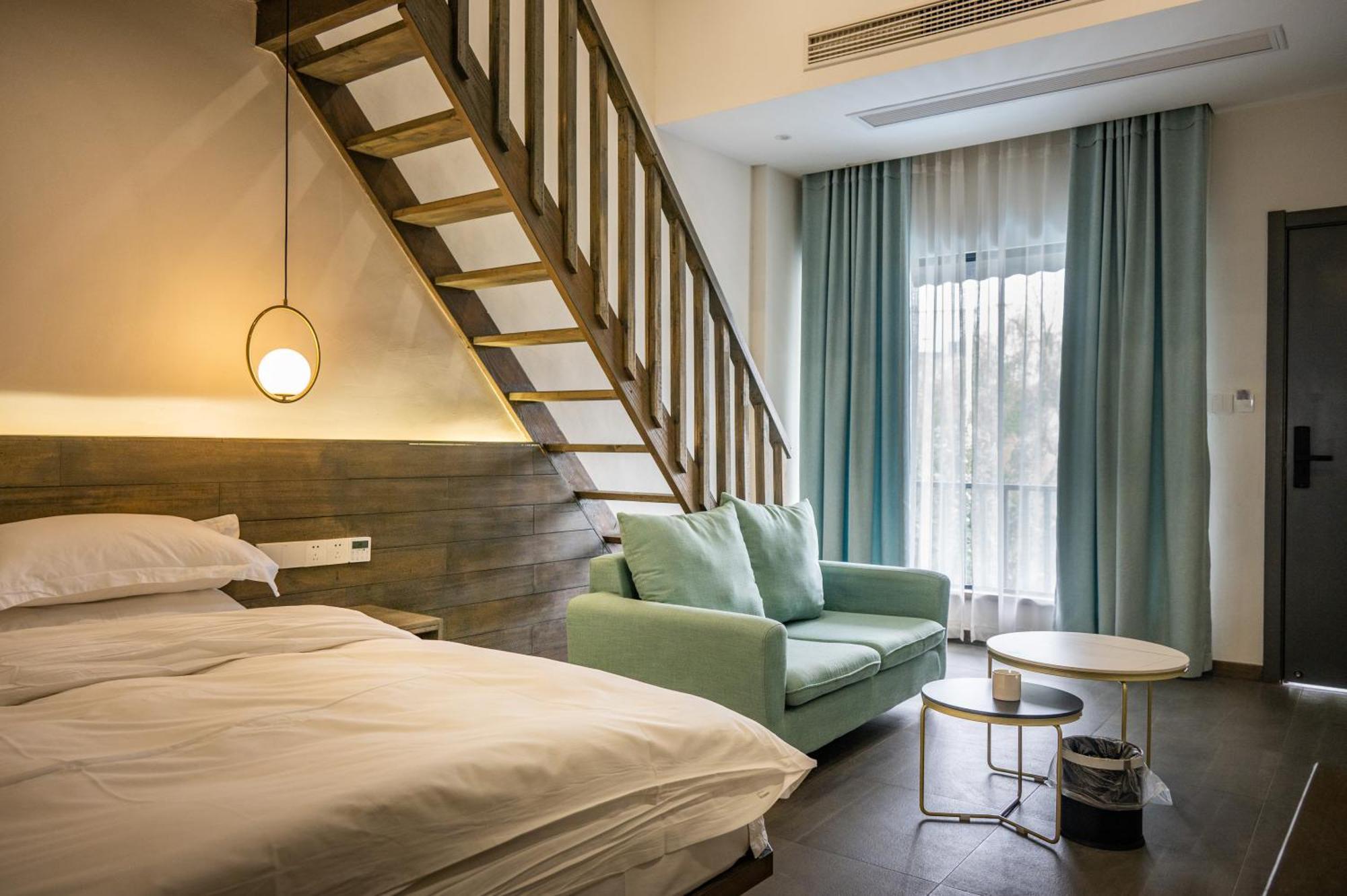 Tingjian Musu Private Soup Design Homestay - South Gate Of Wuzhen Xizha Scenic Area Тунсян Экстерьер фото