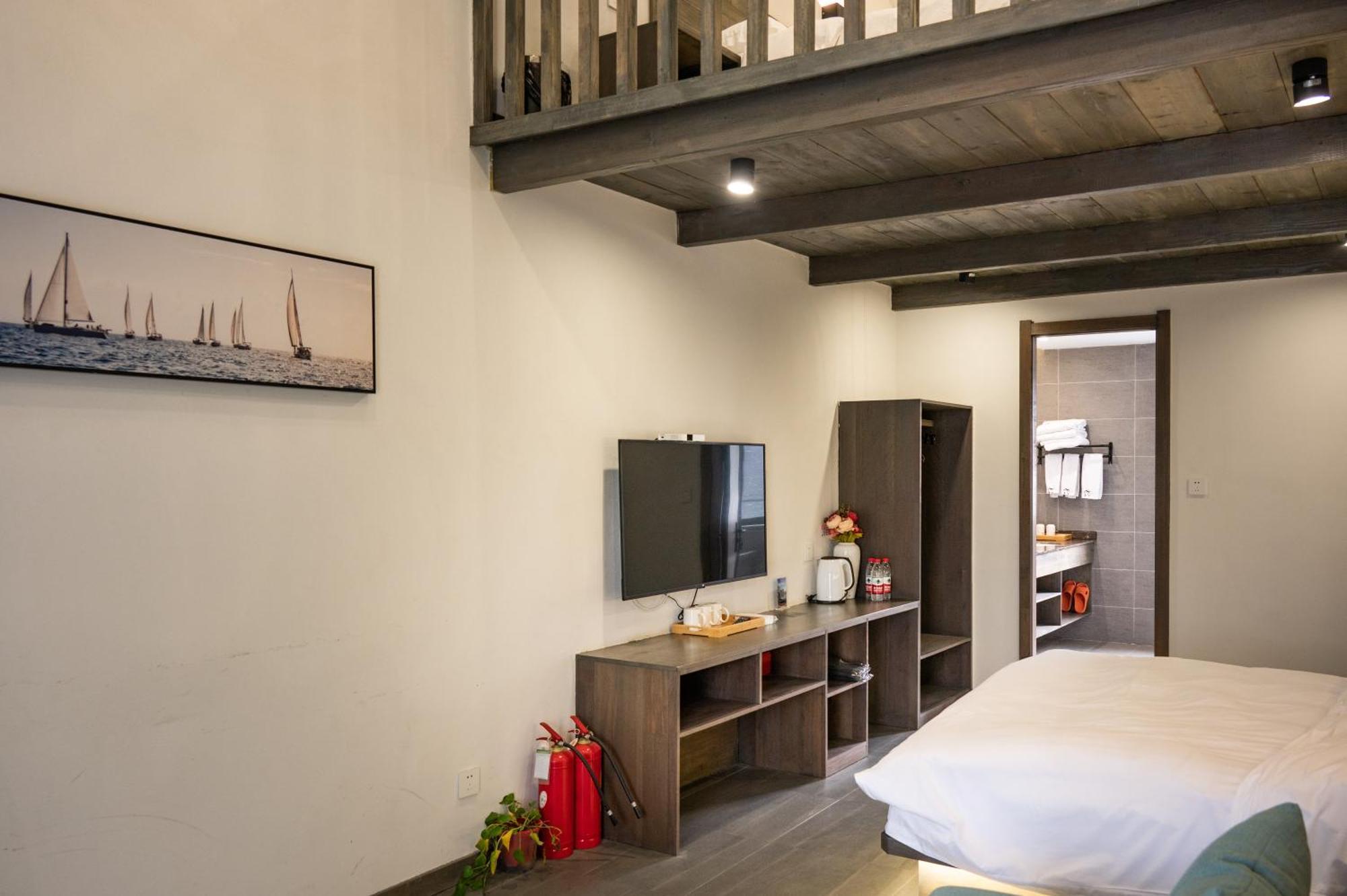 Tingjian Musu Private Soup Design Homestay - South Gate Of Wuzhen Xizha Scenic Area Тунсян Экстерьер фото