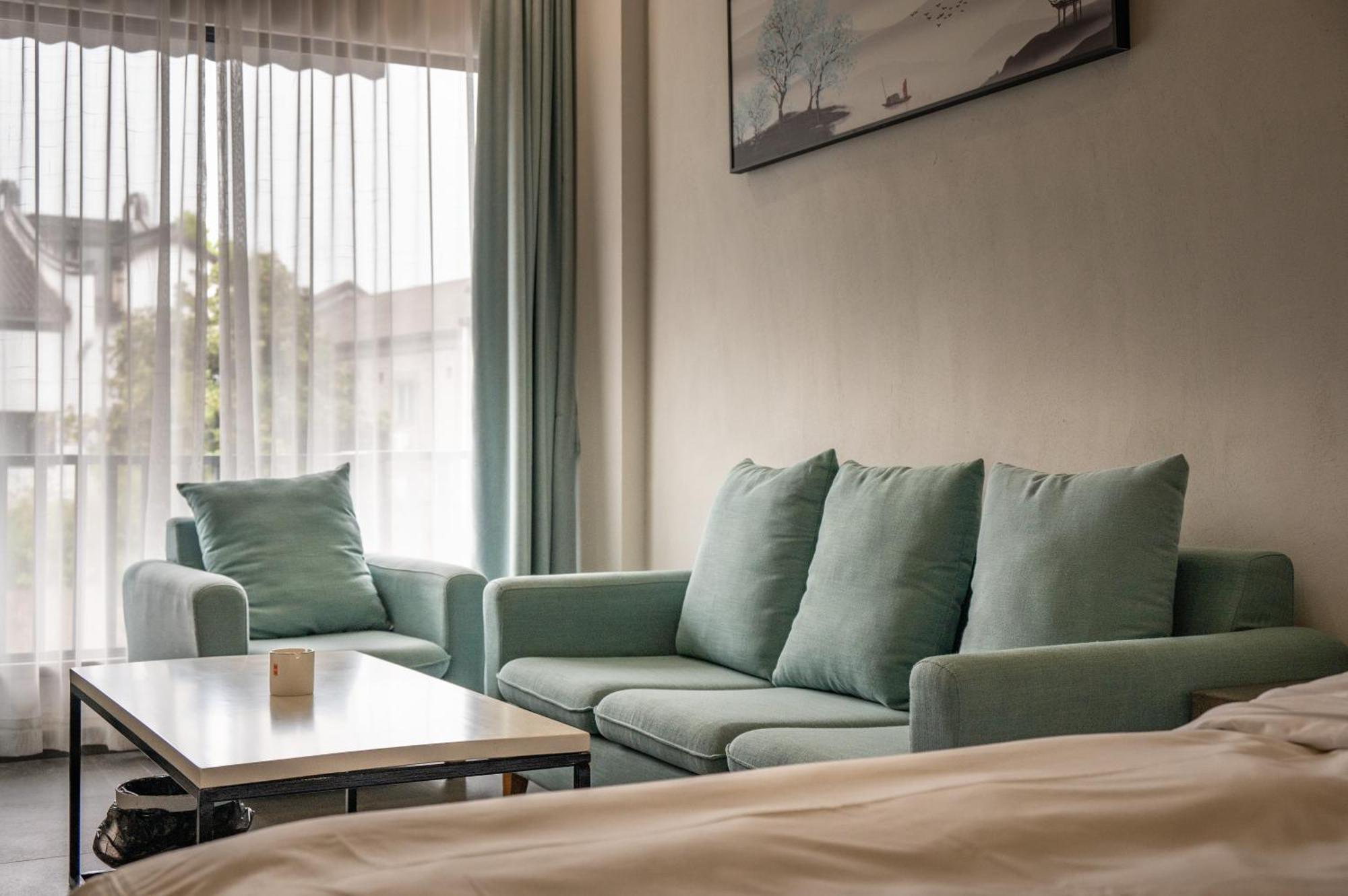 Tingjian Musu Private Soup Design Homestay - South Gate Of Wuzhen Xizha Scenic Area Тунсян Экстерьер фото