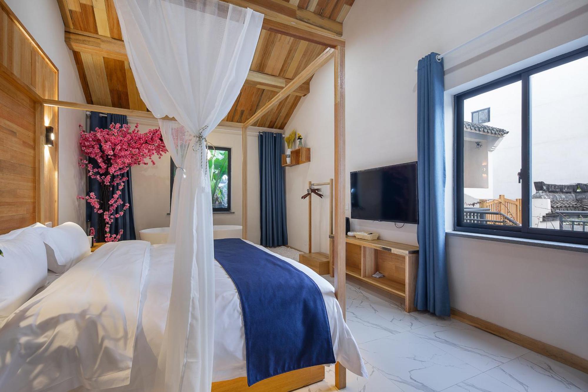 Tingjian Musu Private Soup Design Homestay - South Gate Of Wuzhen Xizha Scenic Area Тунсян Экстерьер фото