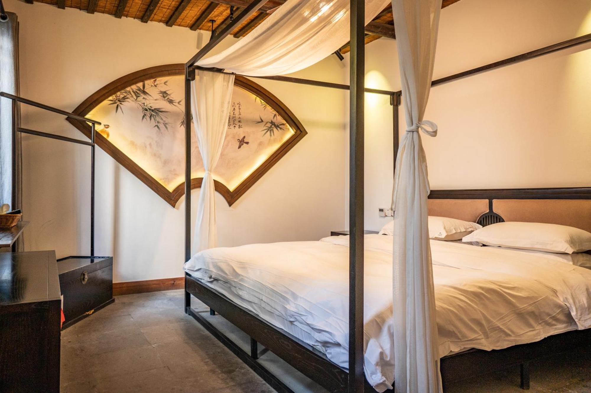 Tingjian Musu Private Soup Design Homestay - South Gate Of Wuzhen Xizha Scenic Area Тунсян Экстерьер фото