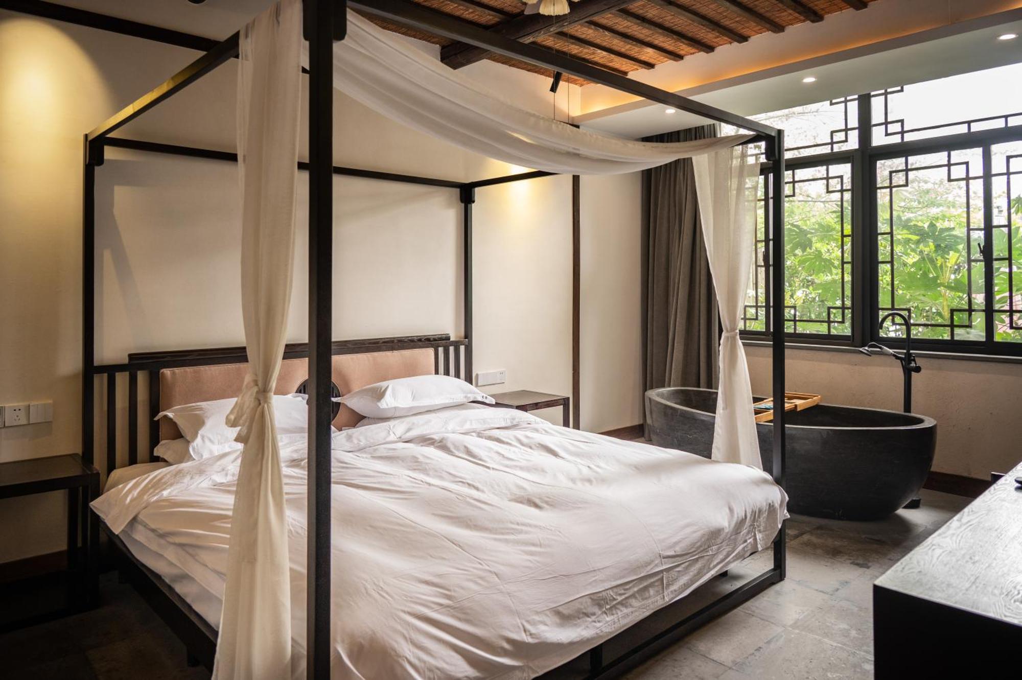 Tingjian Musu Private Soup Design Homestay - South Gate Of Wuzhen Xizha Scenic Area Тунсян Экстерьер фото
