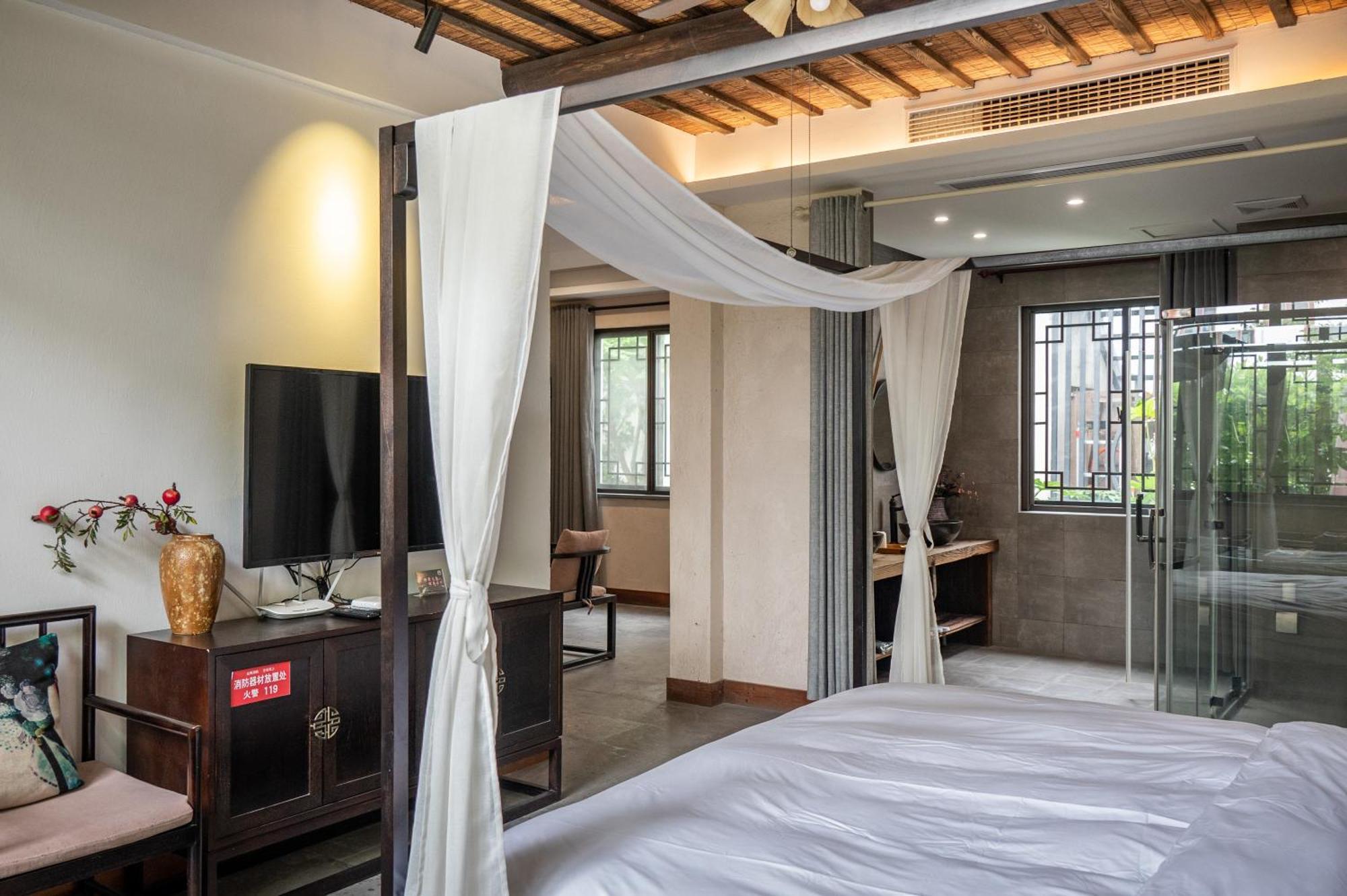 Tingjian Musu Private Soup Design Homestay - South Gate Of Wuzhen Xizha Scenic Area Тунсян Экстерьер фото