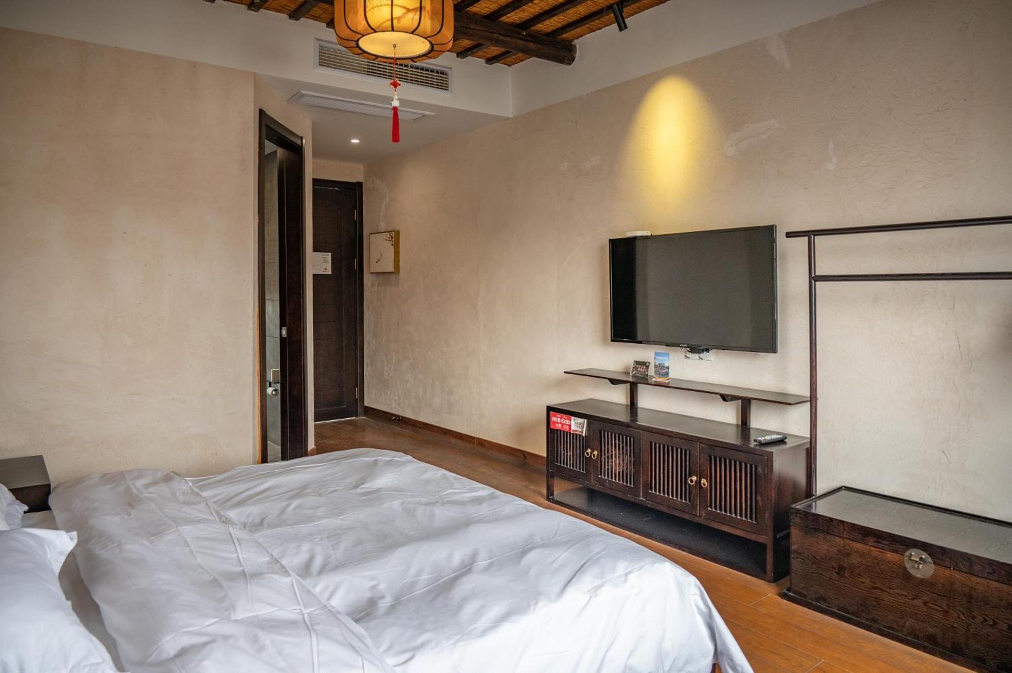 Tingjian Musu Private Soup Design Homestay - South Gate Of Wuzhen Xizha Scenic Area Тунсян Экстерьер фото