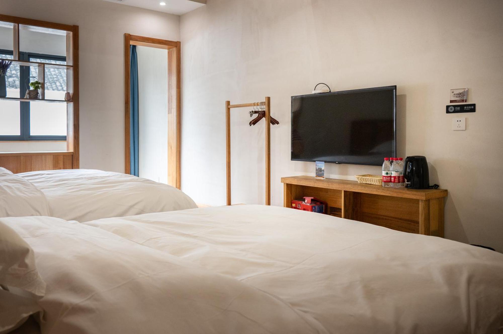 Tingjian Musu Private Soup Design Homestay - South Gate Of Wuzhen Xizha Scenic Area Тунсян Экстерьер фото