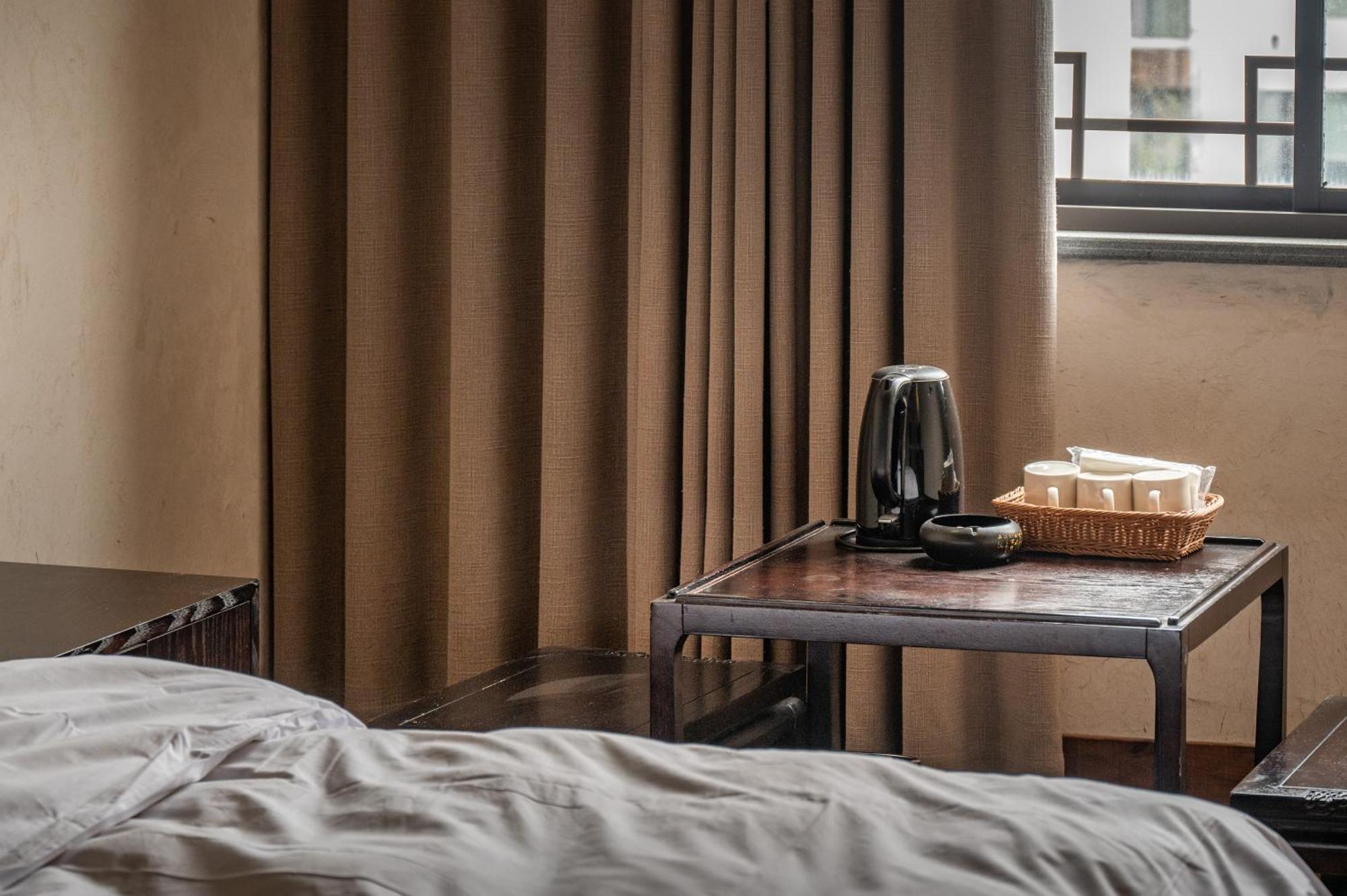 Tingjian Musu Private Soup Design Homestay - South Gate Of Wuzhen Xizha Scenic Area Тунсян Экстерьер фото