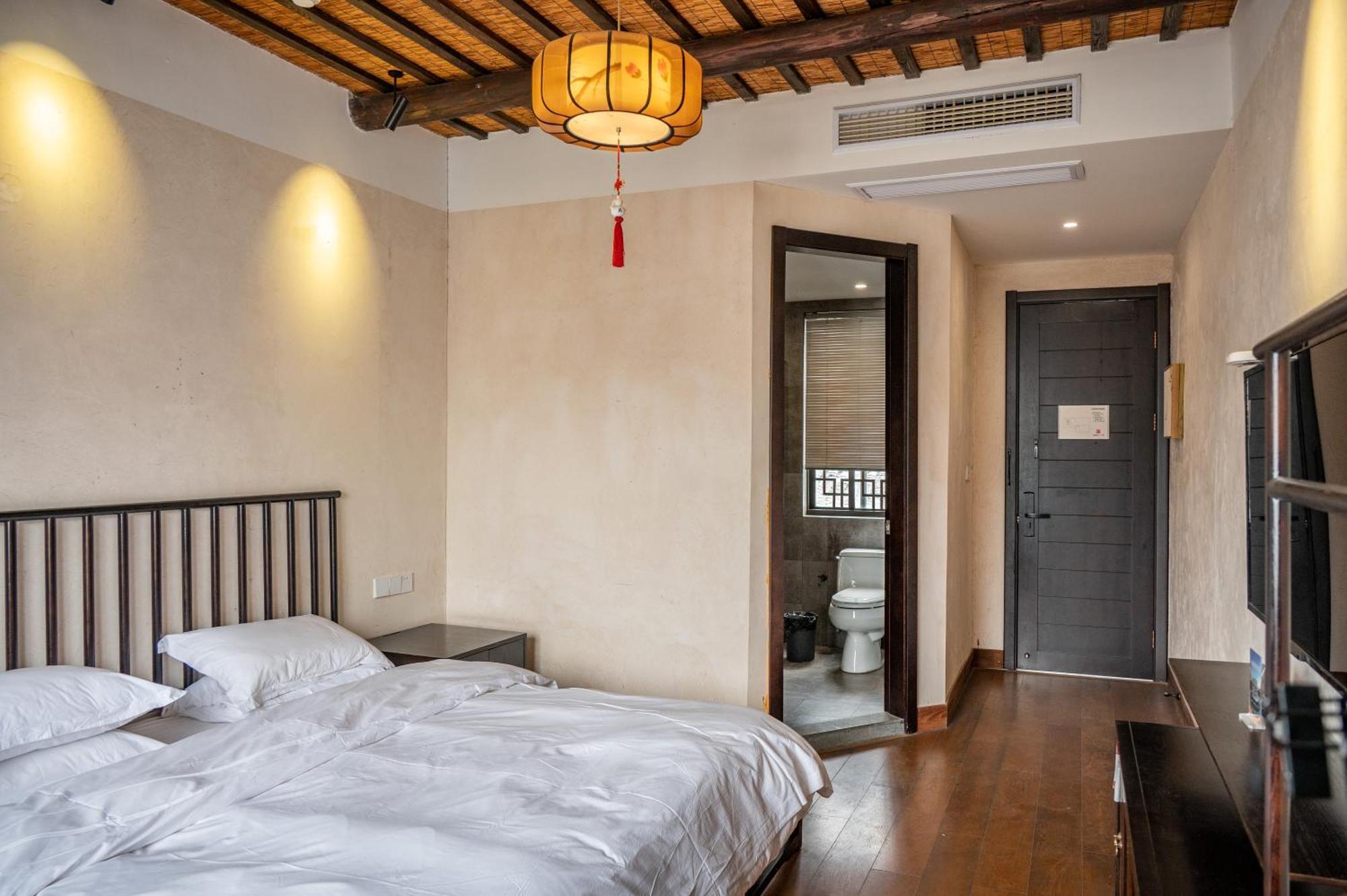Tingjian Musu Private Soup Design Homestay - South Gate Of Wuzhen Xizha Scenic Area Тунсян Экстерьер фото