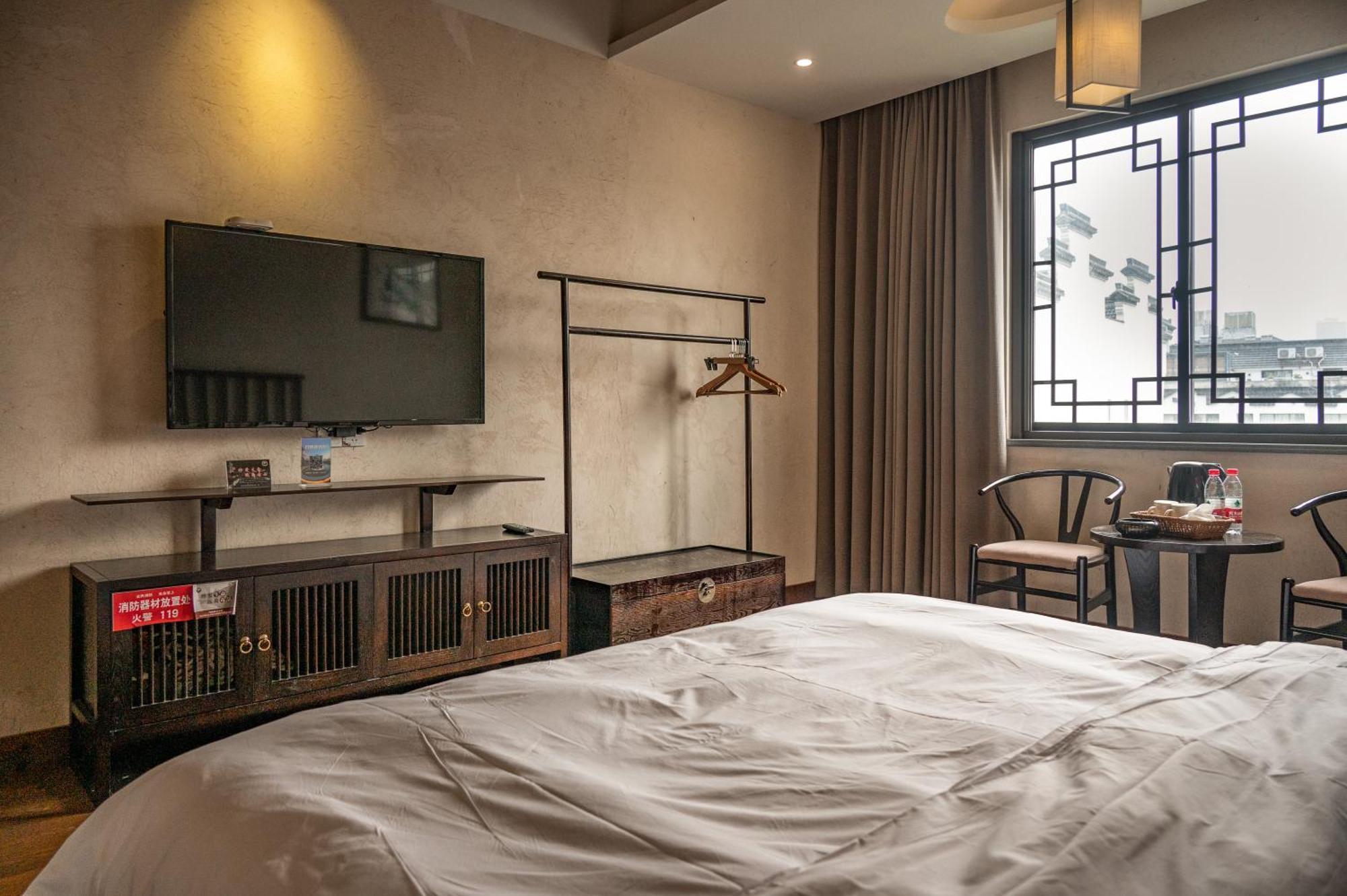 Tingjian Musu Private Soup Design Homestay - South Gate Of Wuzhen Xizha Scenic Area Тунсян Экстерьер фото
